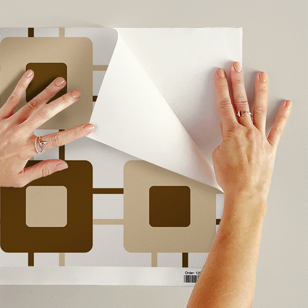 The artwork features a repeating geometric pattern of symmetrical shapes resembling elongated, curved diamonds or petals in various shades of blue and green. Each shape is split vertically with one half filled with a light blue and the other half filled with green or darker blue. The background is a light, almost pastel blue, which provides a soft yet vibrant backdrop. One of the blue shapes near the upper left contains a white starburst element, adding a focal point of brightness to the composition. The overall design conveys a modern, mid-century aesthetic with clean lines and harmonious color contrasts.